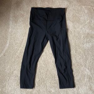 Athleta ultimate stash pocket 7/8 tight, Black, size M